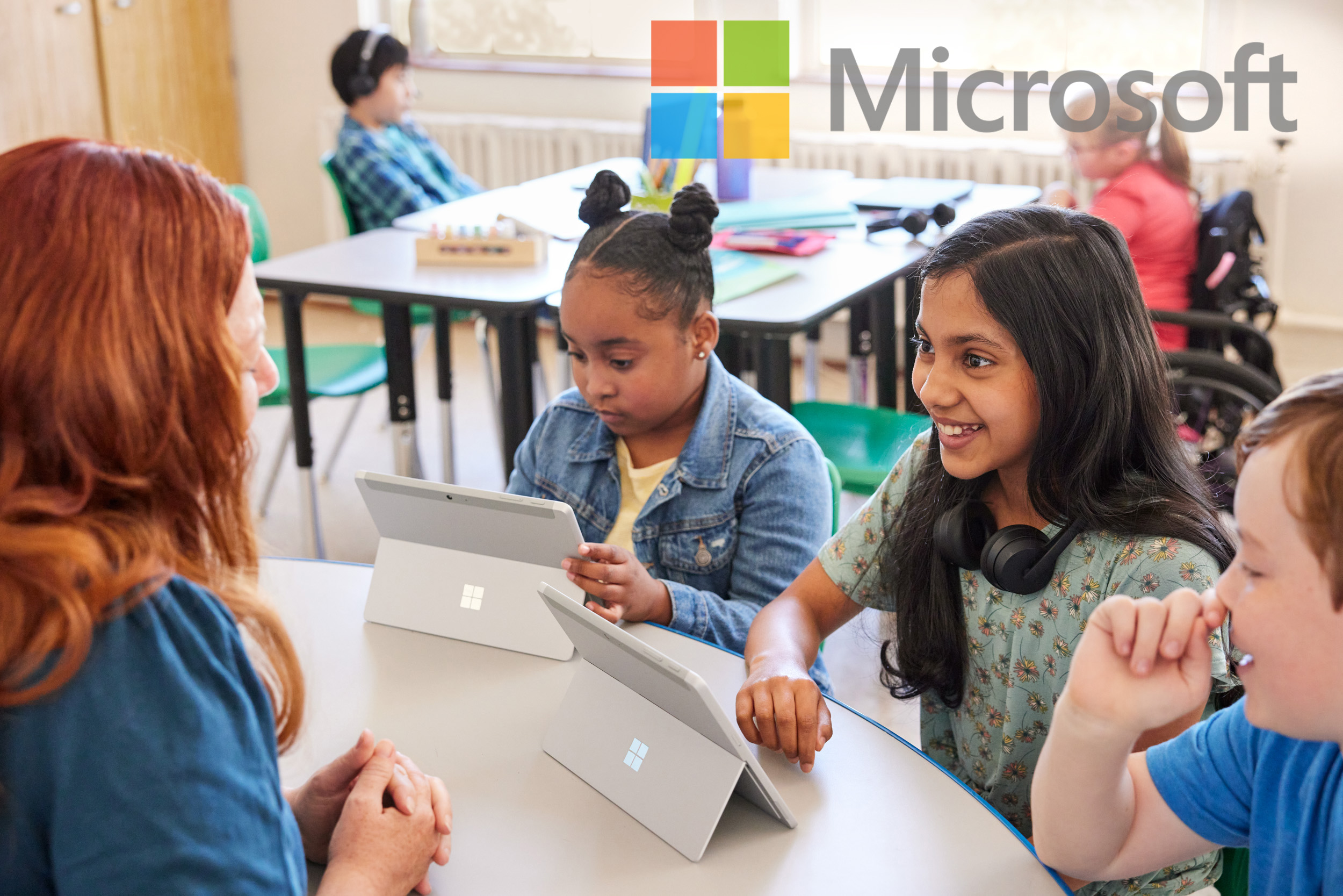 A middle school student works in a group setting in a Microsoft Ad Campaign photographed by Lifestyle Photographer Diana Mulvihill