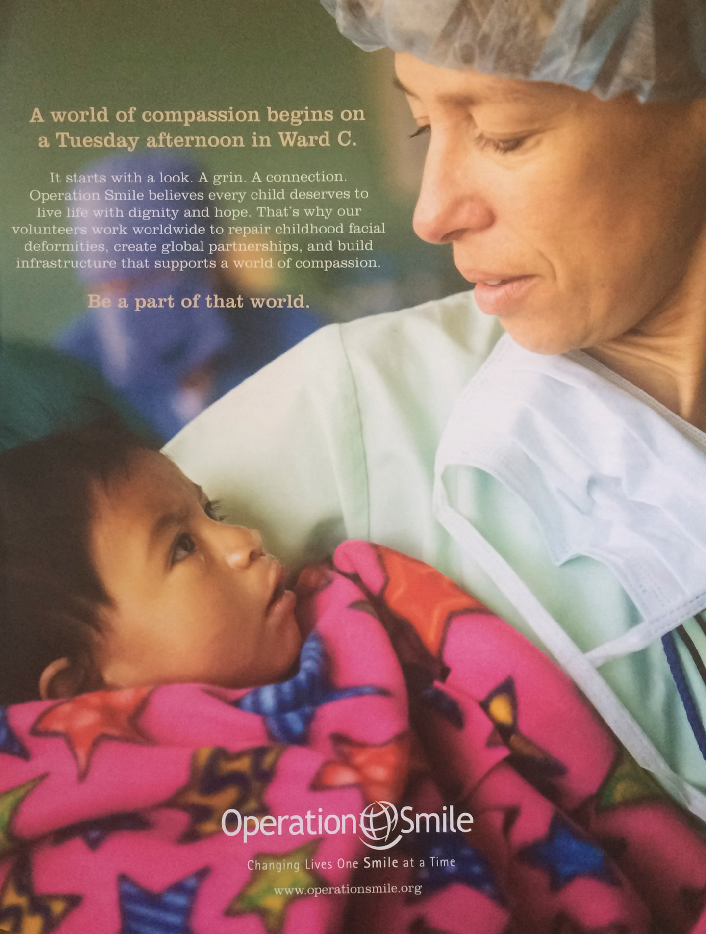 A nurse looks down at an infant waking up from surgery in an  Ad Campaign for Operation Smile photographed by Lifestyle Photographer Diana Mulvihill