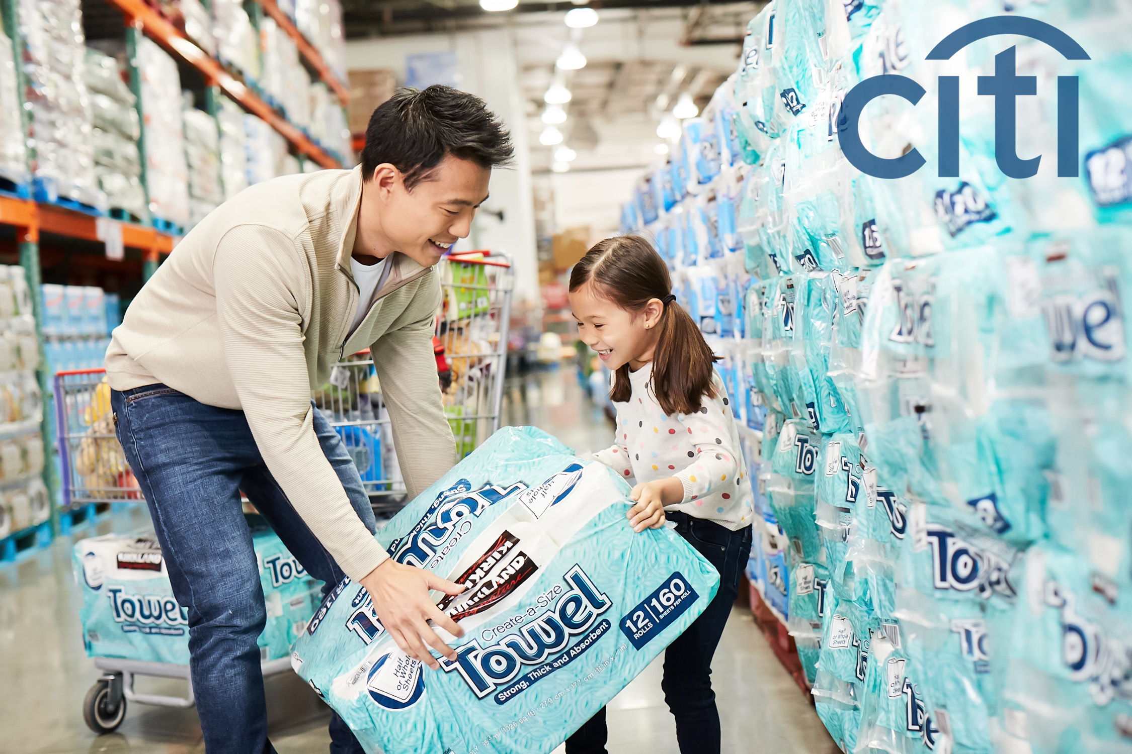 A father and his daughter purchase products at Costco in a Citibank Ad Campaign photographed by Lifestyle Photographer Diana Mulvihill