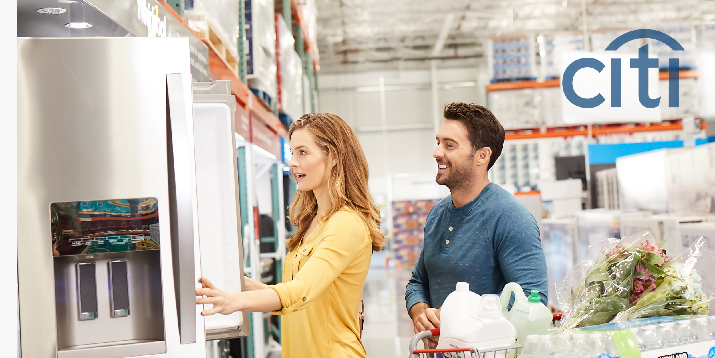 A woman and her husband shop for appliances at Costco in a Citibank Ad Campaign photographed by Lifestyle Photographer Diana Mulvihill