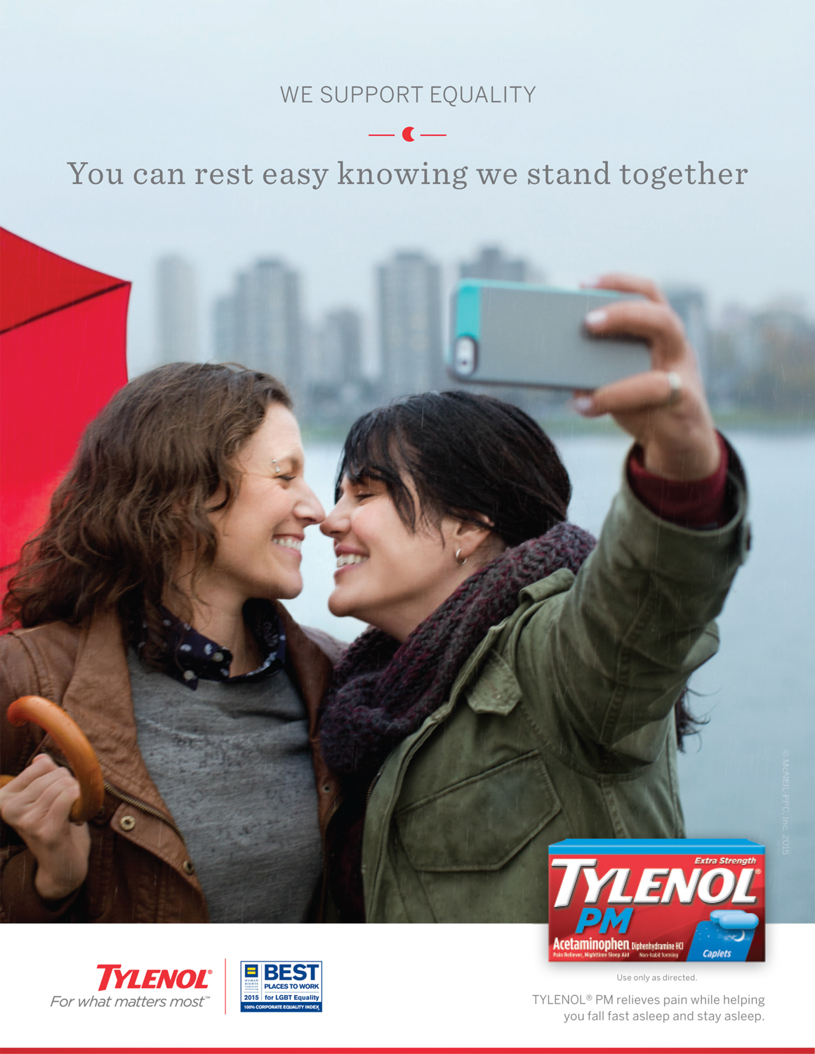 An LGBT couple kiss while taking a selfie in a Tylenol Ad Campaign photographed by Lifestyle Photographer Diana Mulvihill