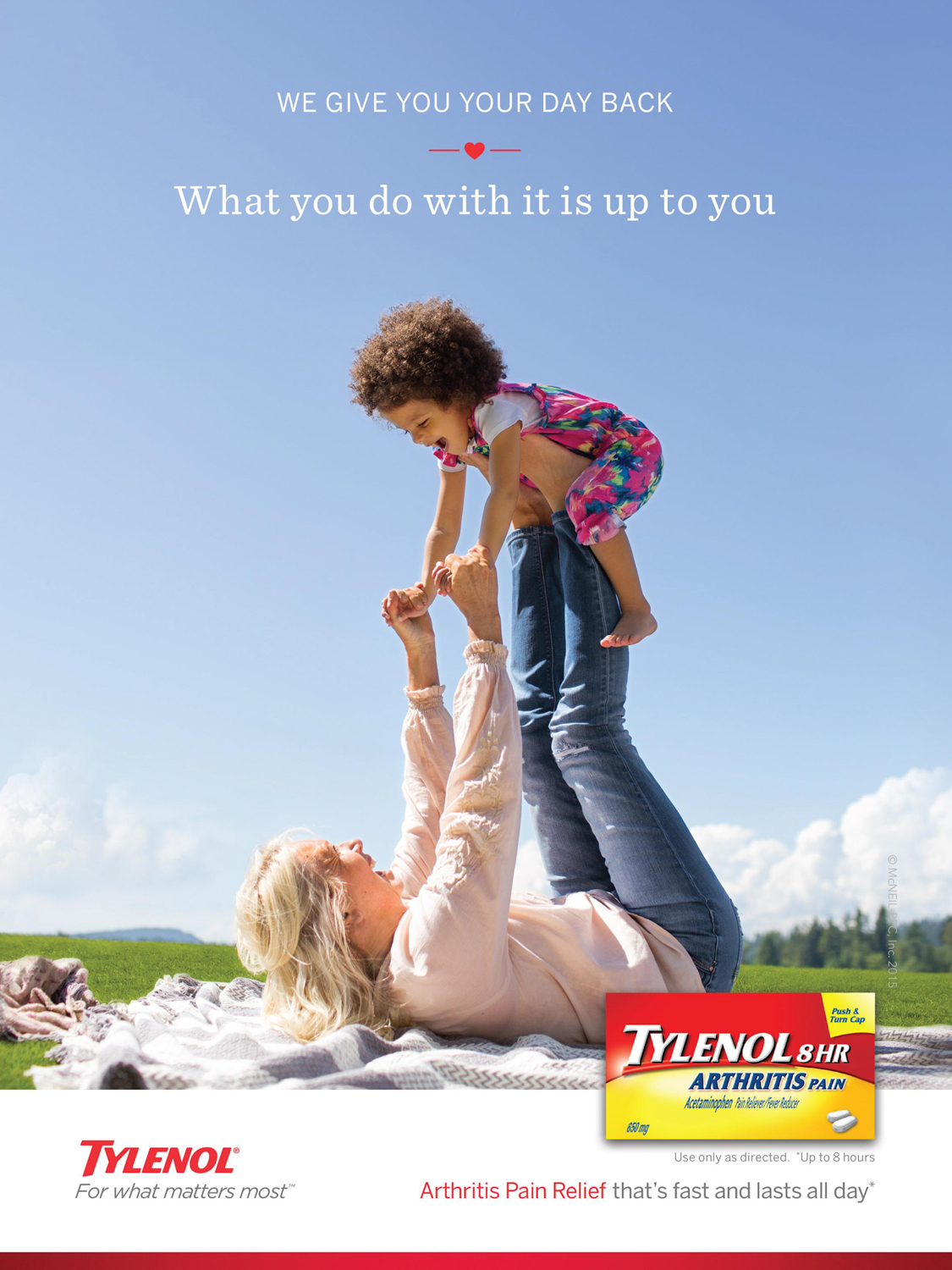 A woman plays outside with her granddaughter in a Tylenol Ad Campaign photographed by Lifestyle Photographer Diana Mulvihill